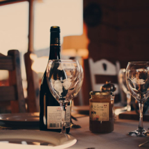 Closeup of dinner table with wine
